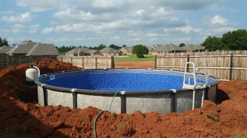 Above ground pool partial bury