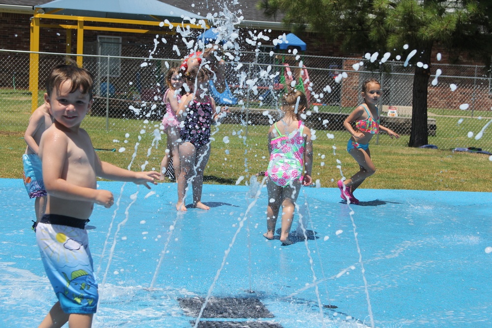 kids playing in splash pad